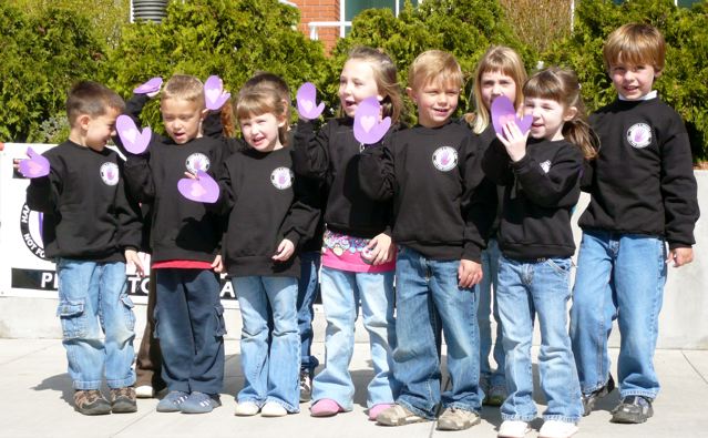 Children from the Klamath KID Center mark the final day of April's Child Abuse Prevention Month by leading the participants in the Hands and Words Are Not For Hurting Pledge at the 'Creating Hope for Our Community' rally outside the Klamath County Government Center. 